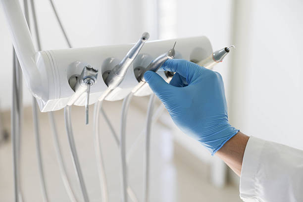 Professional Emergency Dentist technician working in Manhasset, NY